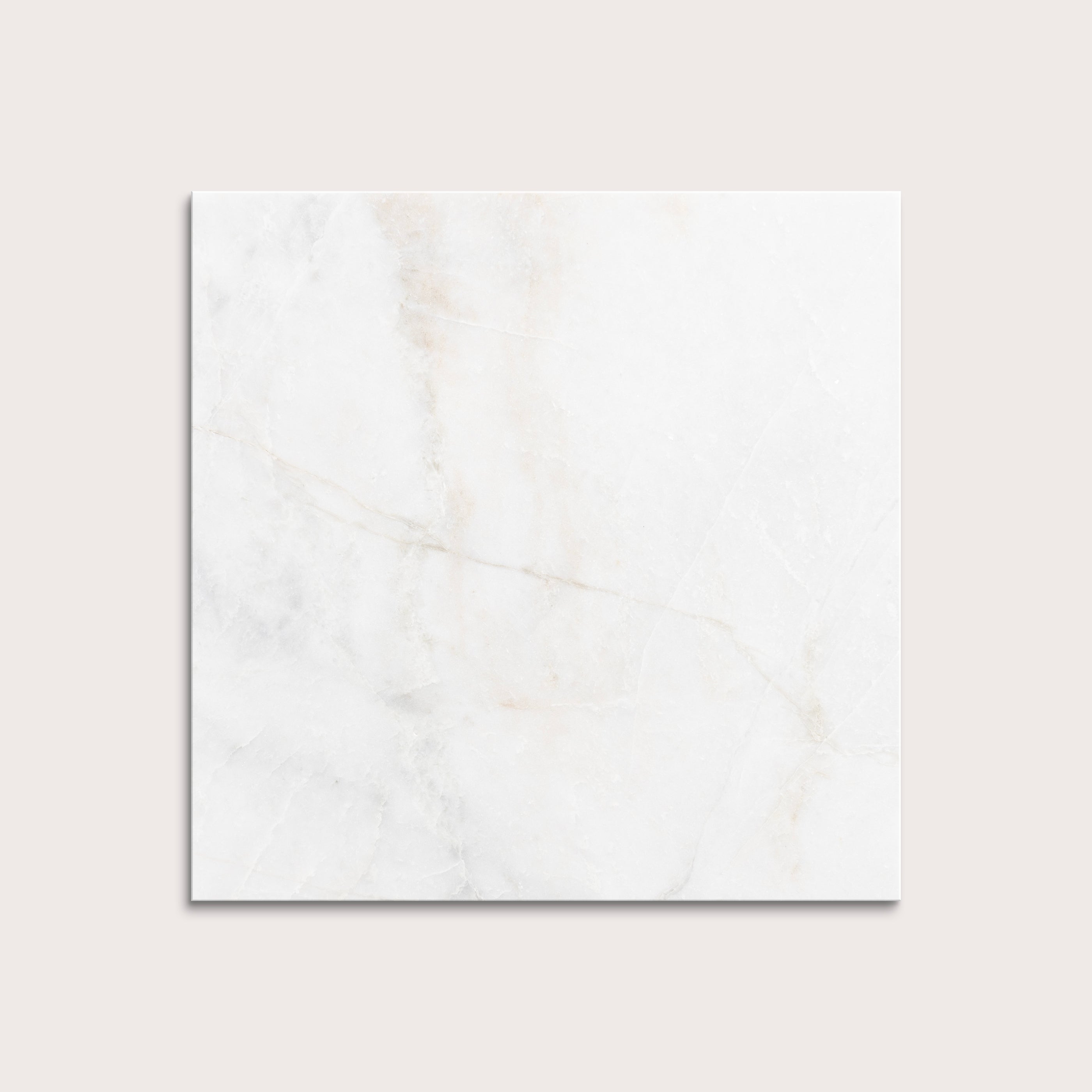 casablanca gold White marble tiles on a light gray background