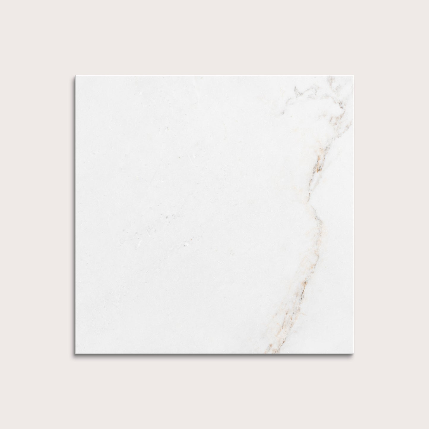 casablanca gold White marble tiles on a light gray background