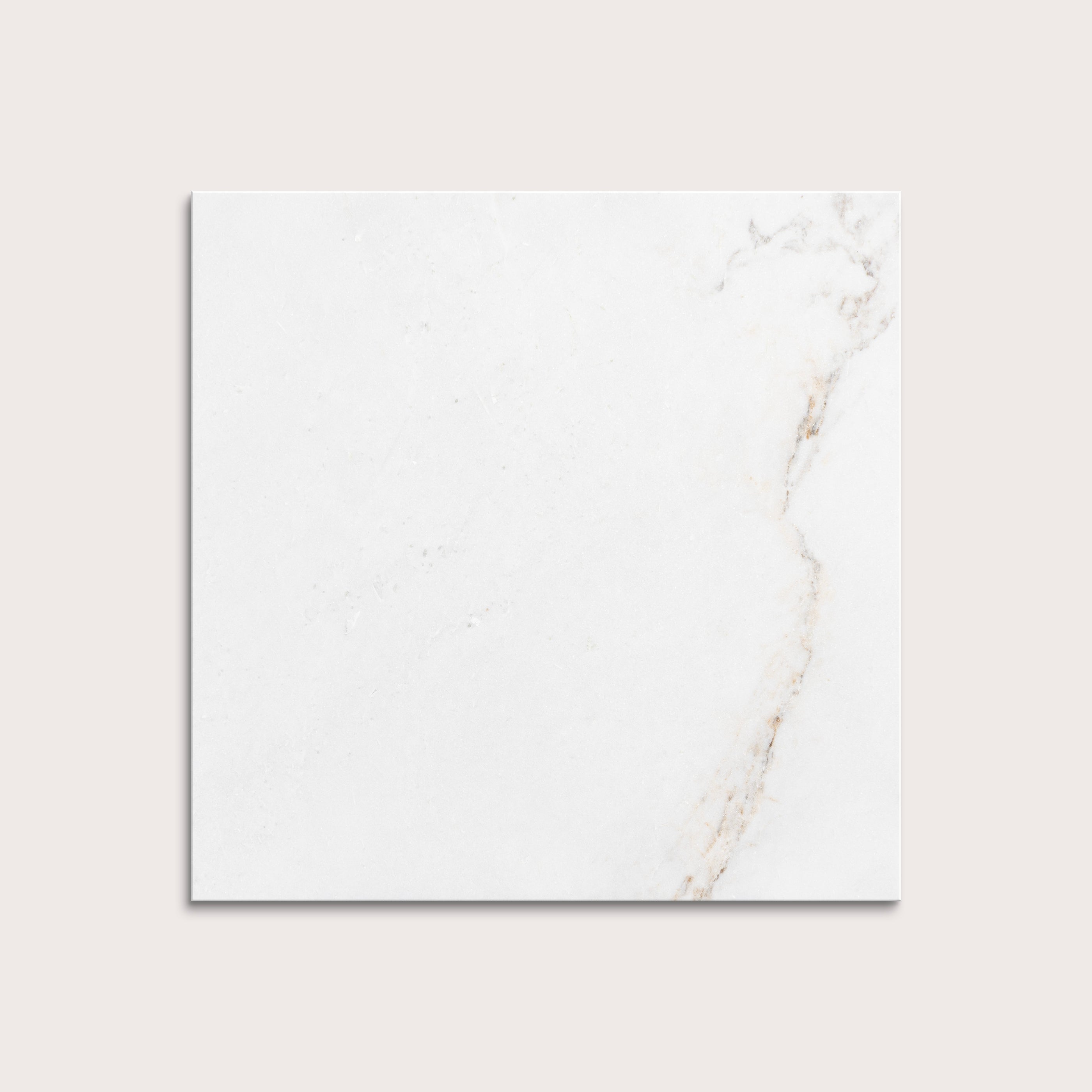 casablanca gold White marble tiles on a light gray background