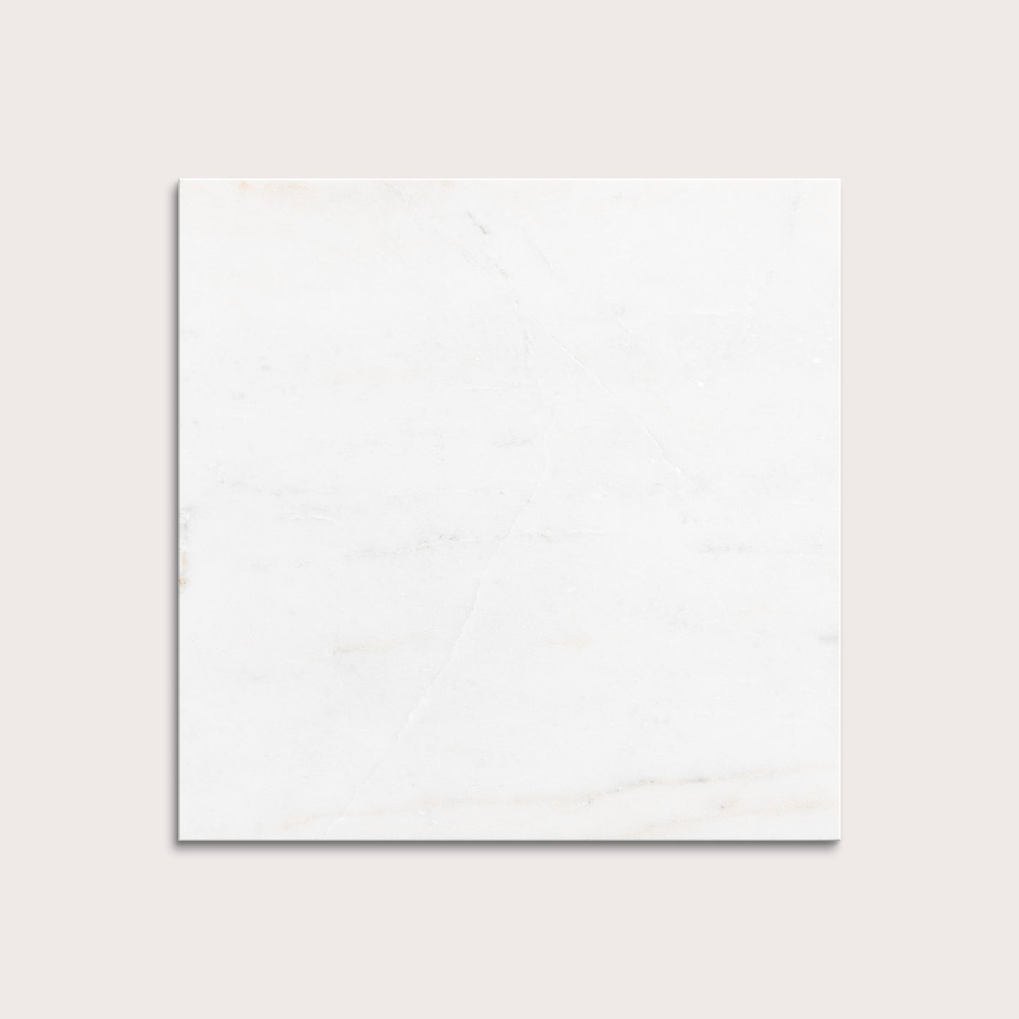 casablanca gold White marble tiles on a light gray background