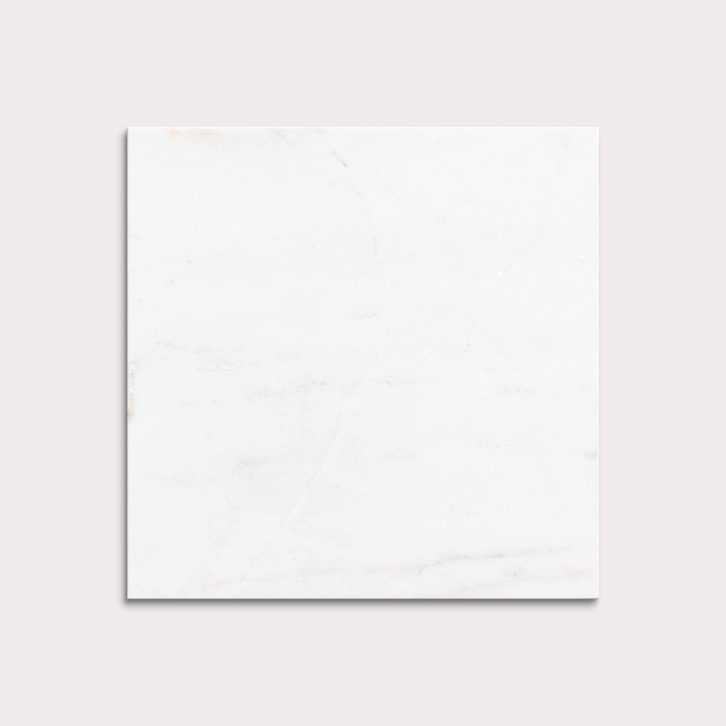 casablanca gold White marble tiles on a light gray background