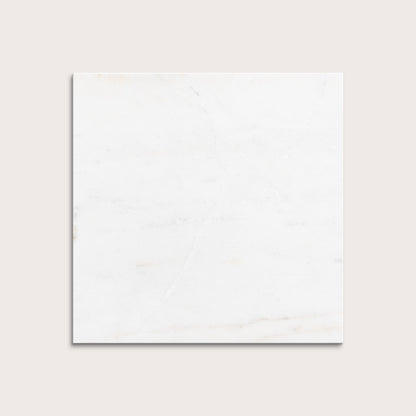 casablanca gold White marble tiles on a light gray background