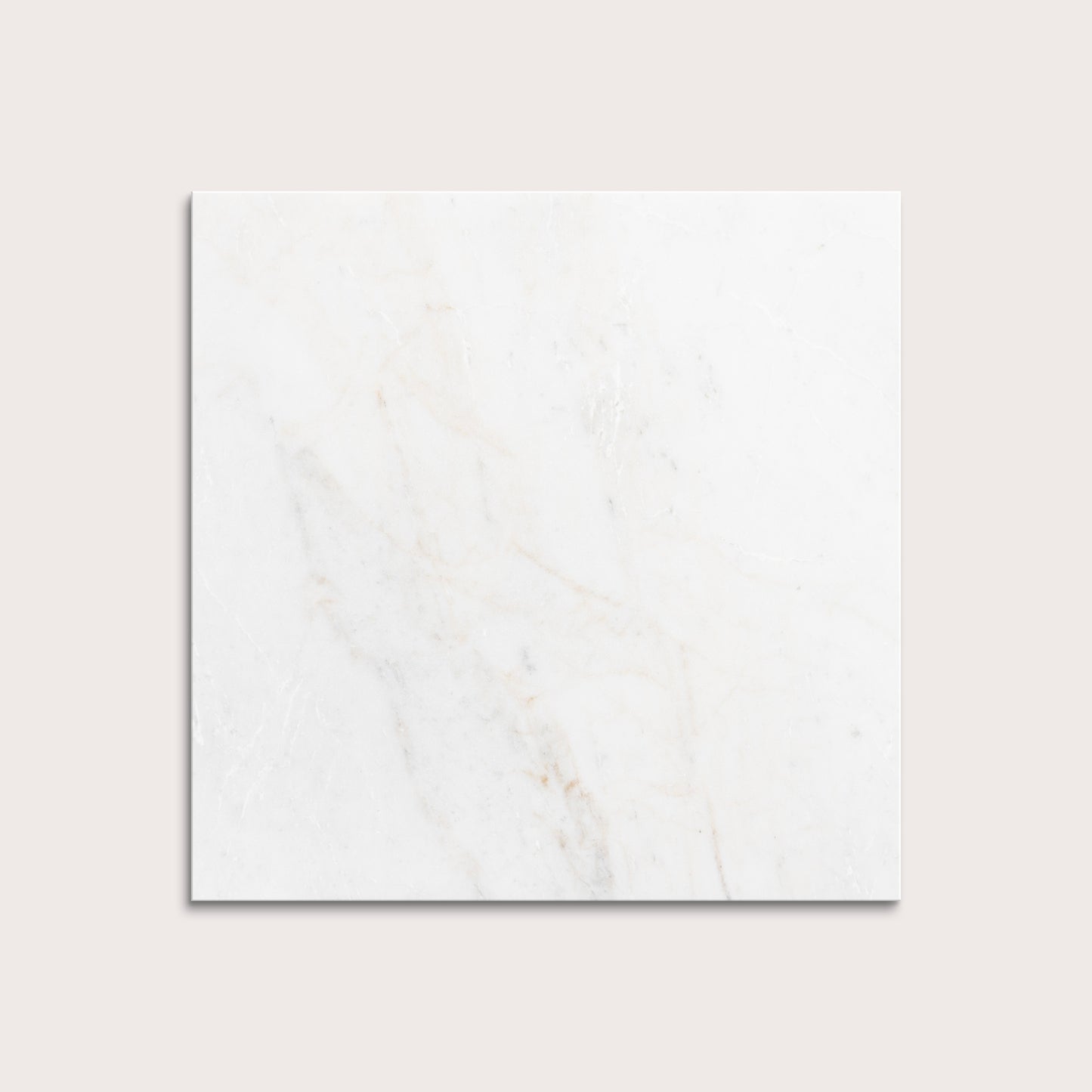 casablanca gold White marble tiles on a light gray background