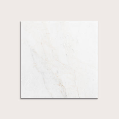 casablanca gold White marble tiles on a light gray background