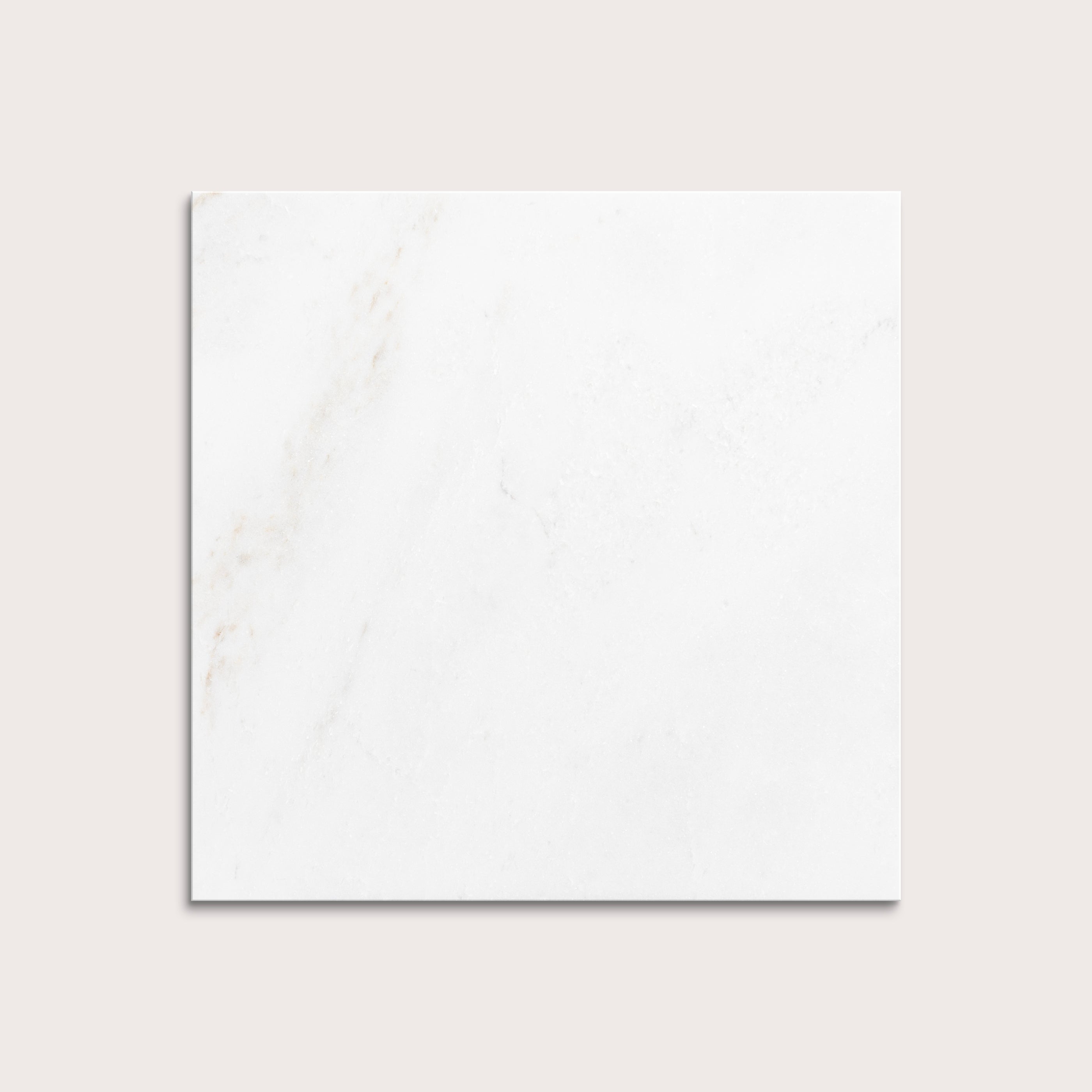 casablanca gold White marble tiles on a light gray background