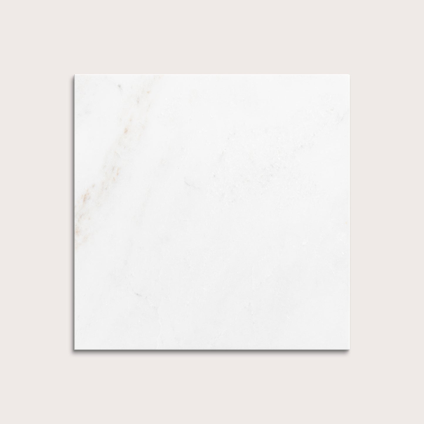 casablanca gold White marble tiles on a light gray background