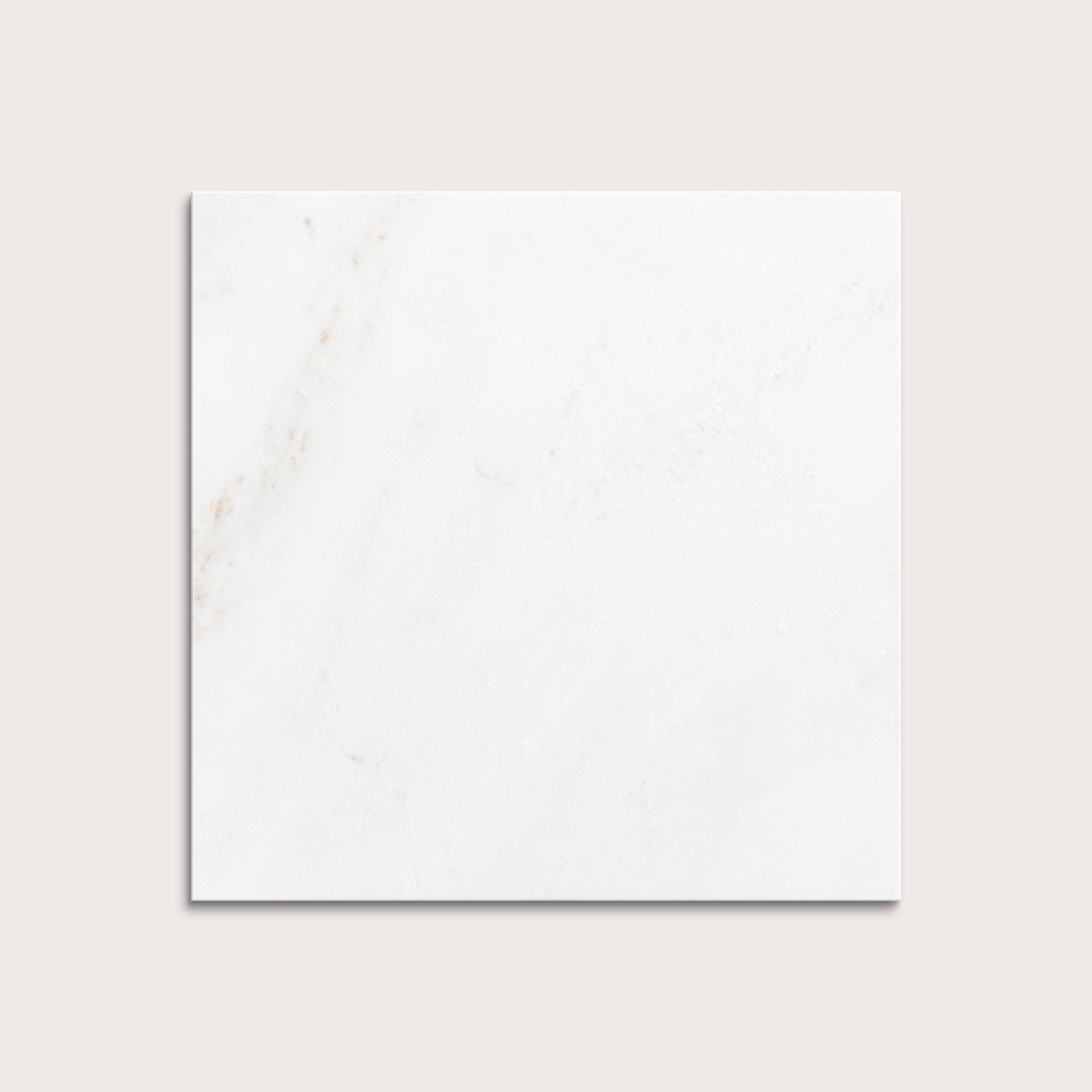 casablanca gold White marble tiles on a light gray background