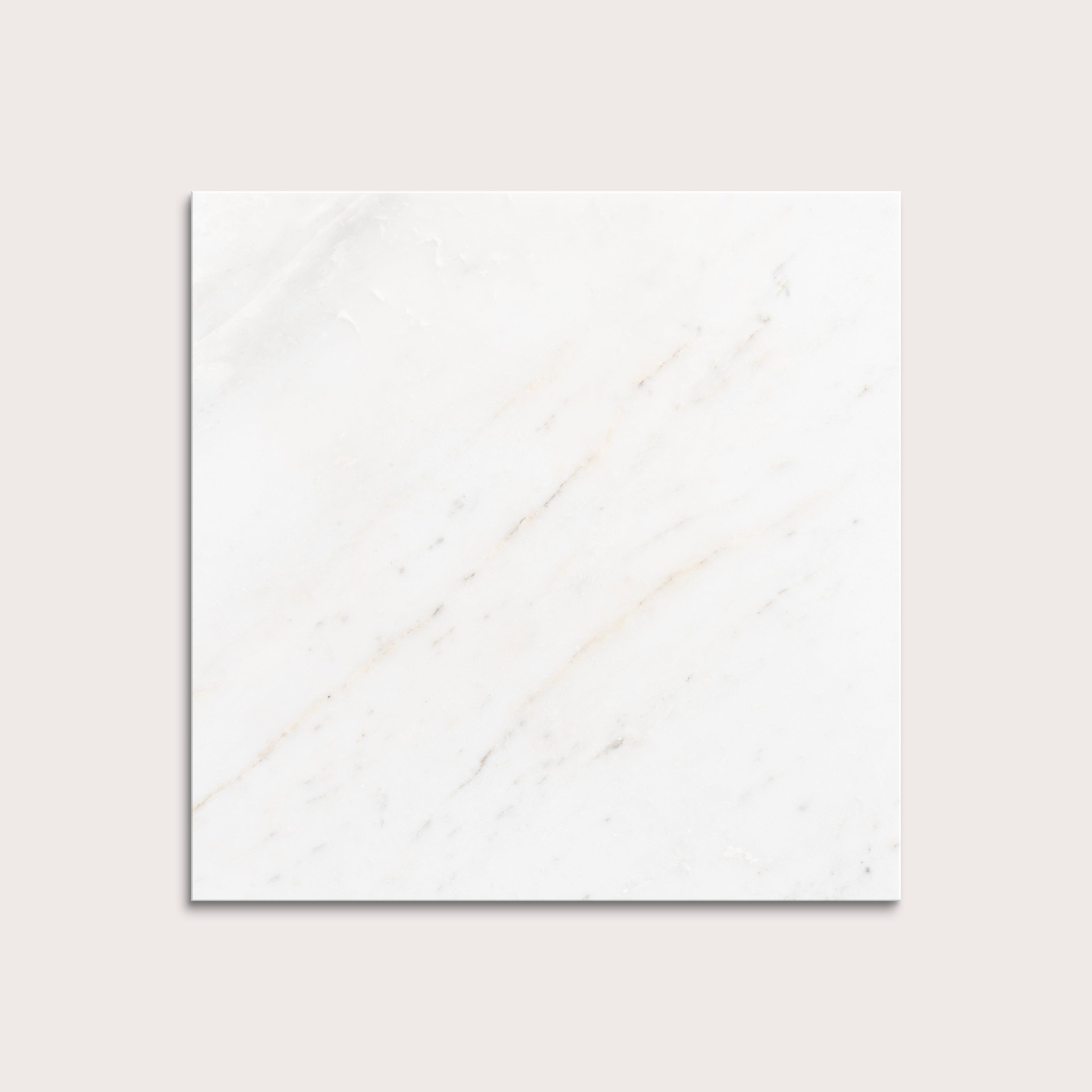 casablanca gold White marble tiles on a light gray background