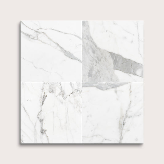 italian statuary white and grey marble tiles in a grid pattern on a light gray background