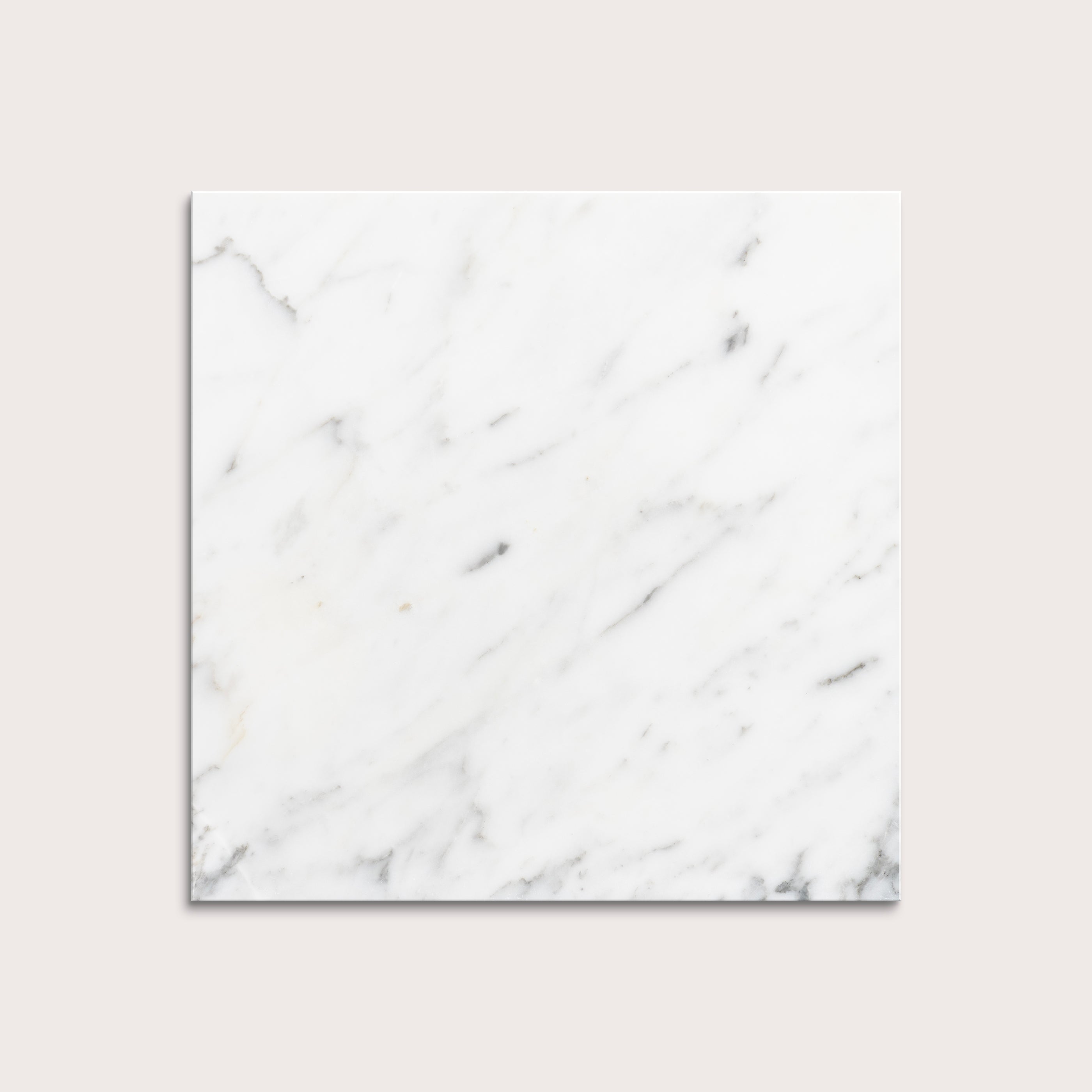 italian statuary white and grey marble tiles  on a light gray background