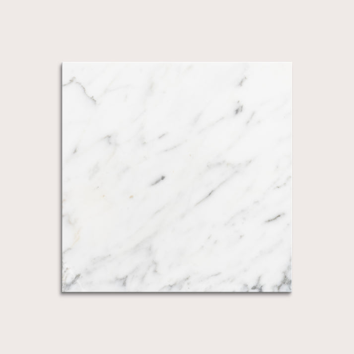 italian statuary white and grey marble tiles  on a light gray background