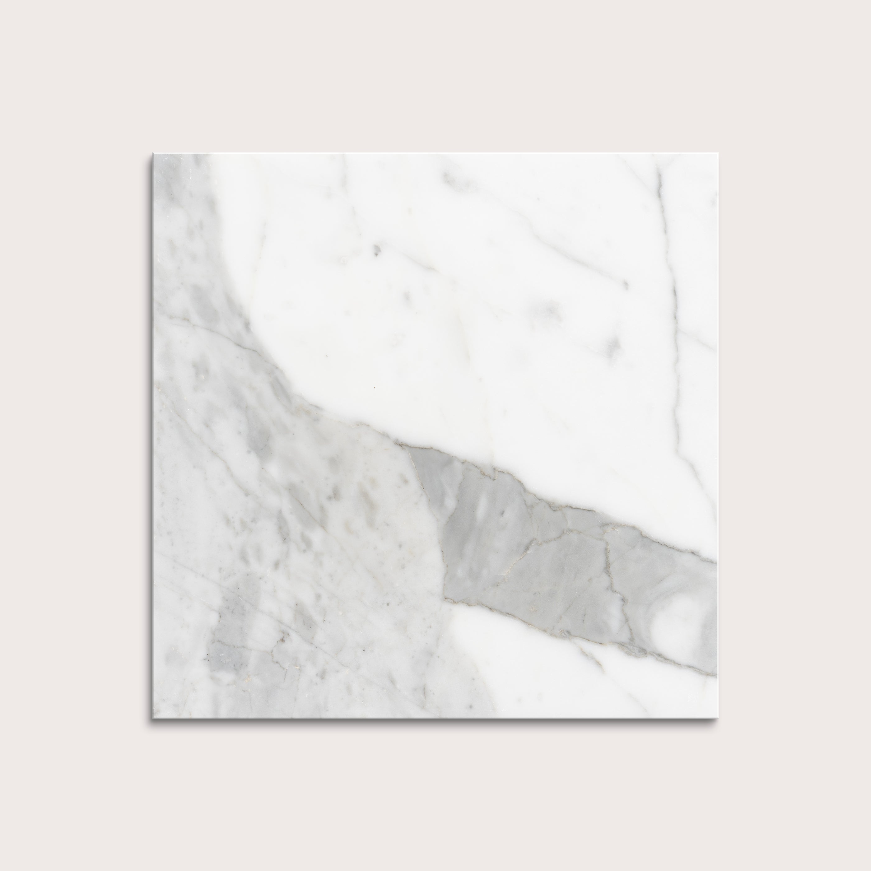 italian statuary white and grey marble tiles  on a light gray background