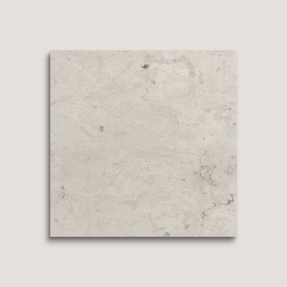Square tile with a light gray marbled pattern on a white background