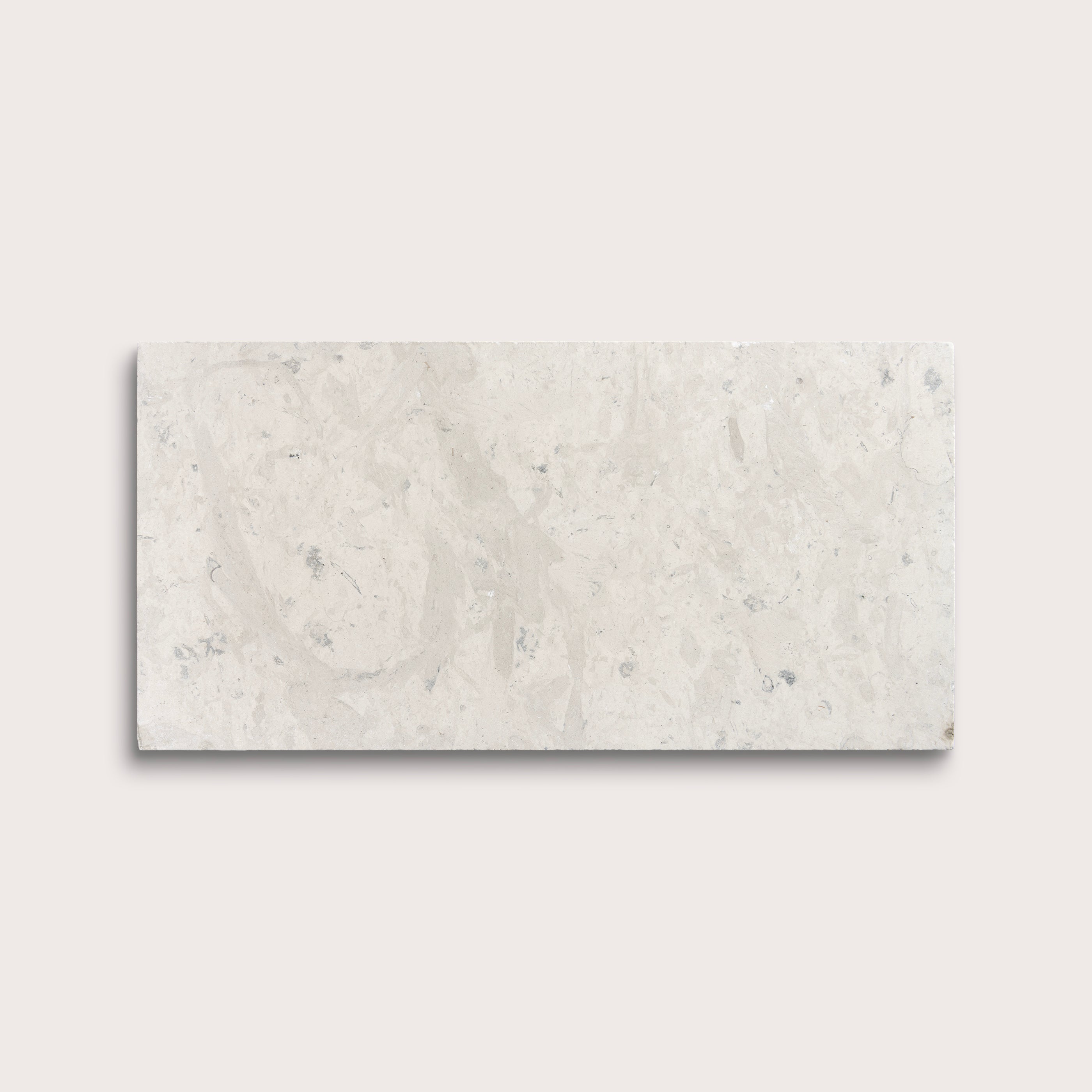 rectangular tile with a grey limestone pattern on a white background
