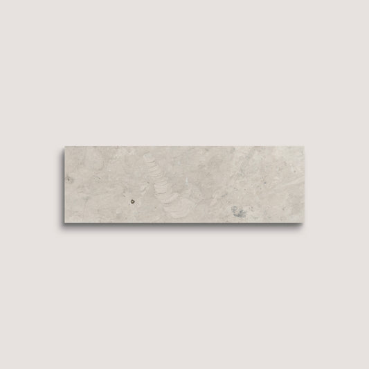 grey limestone rectangle tile on a white background