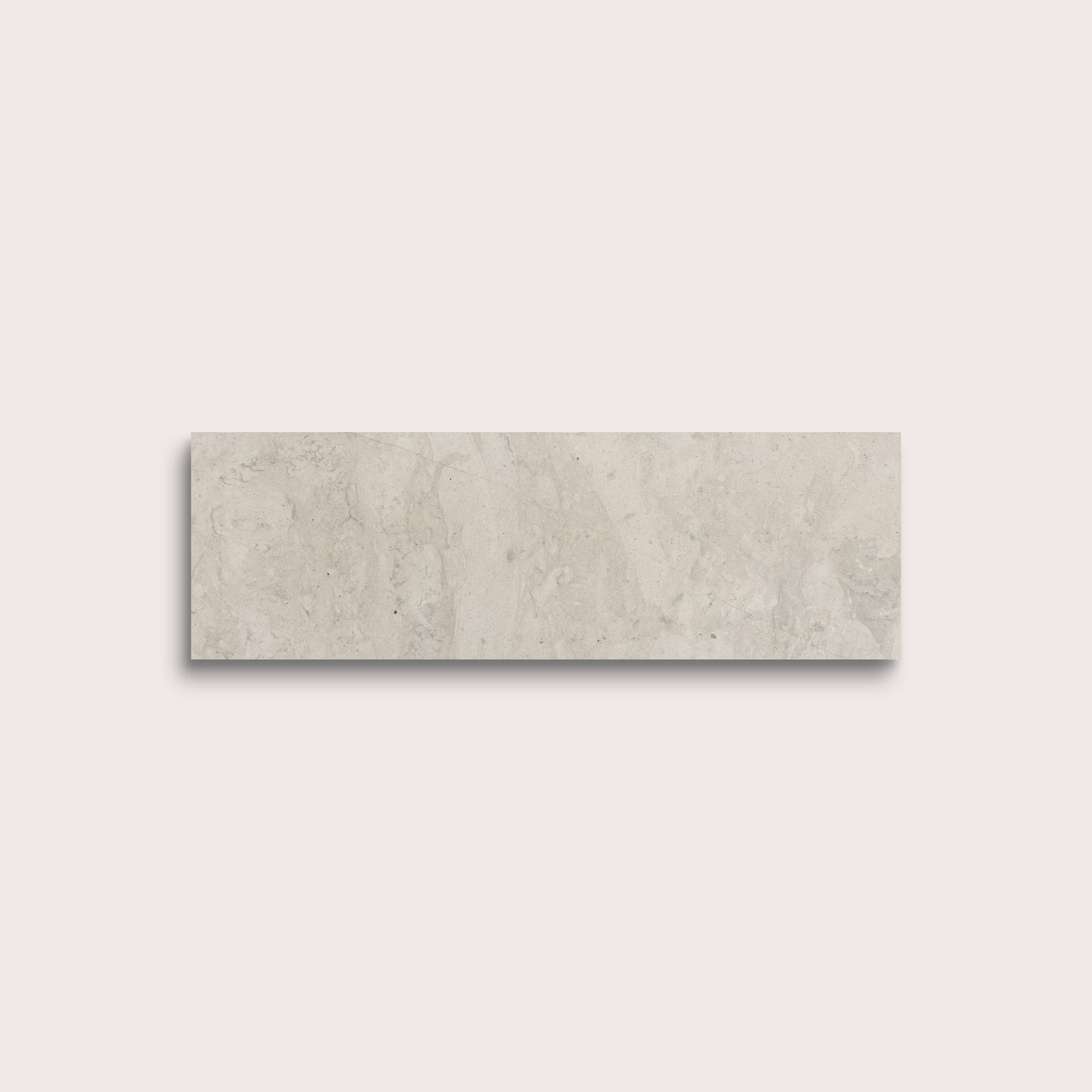 Rectangular beige tile on a light gray background