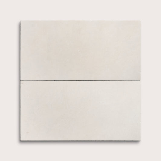 two rectangle tiles with a white limestone pattern on a white background