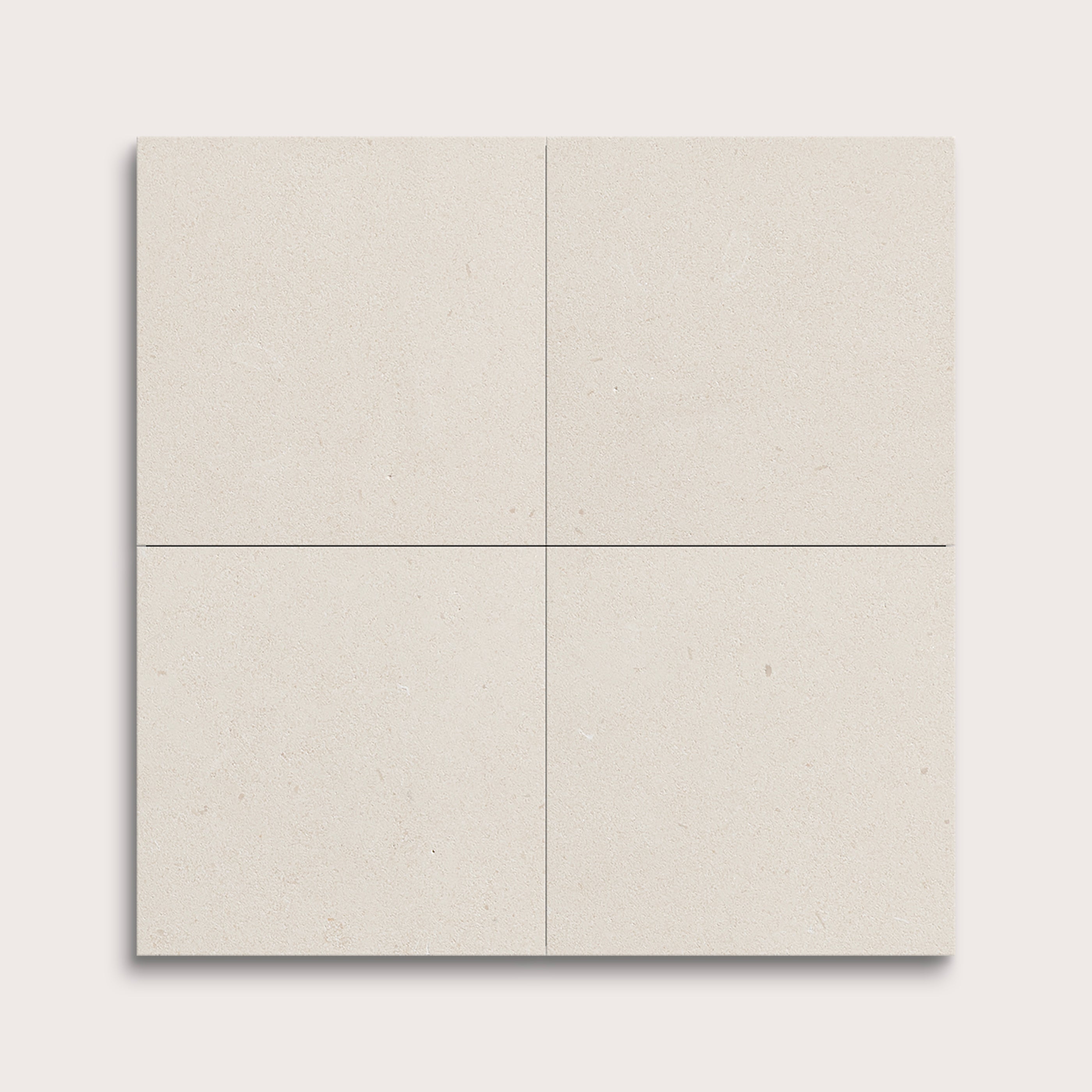 four square tiles with a white limestone pattern on a white background