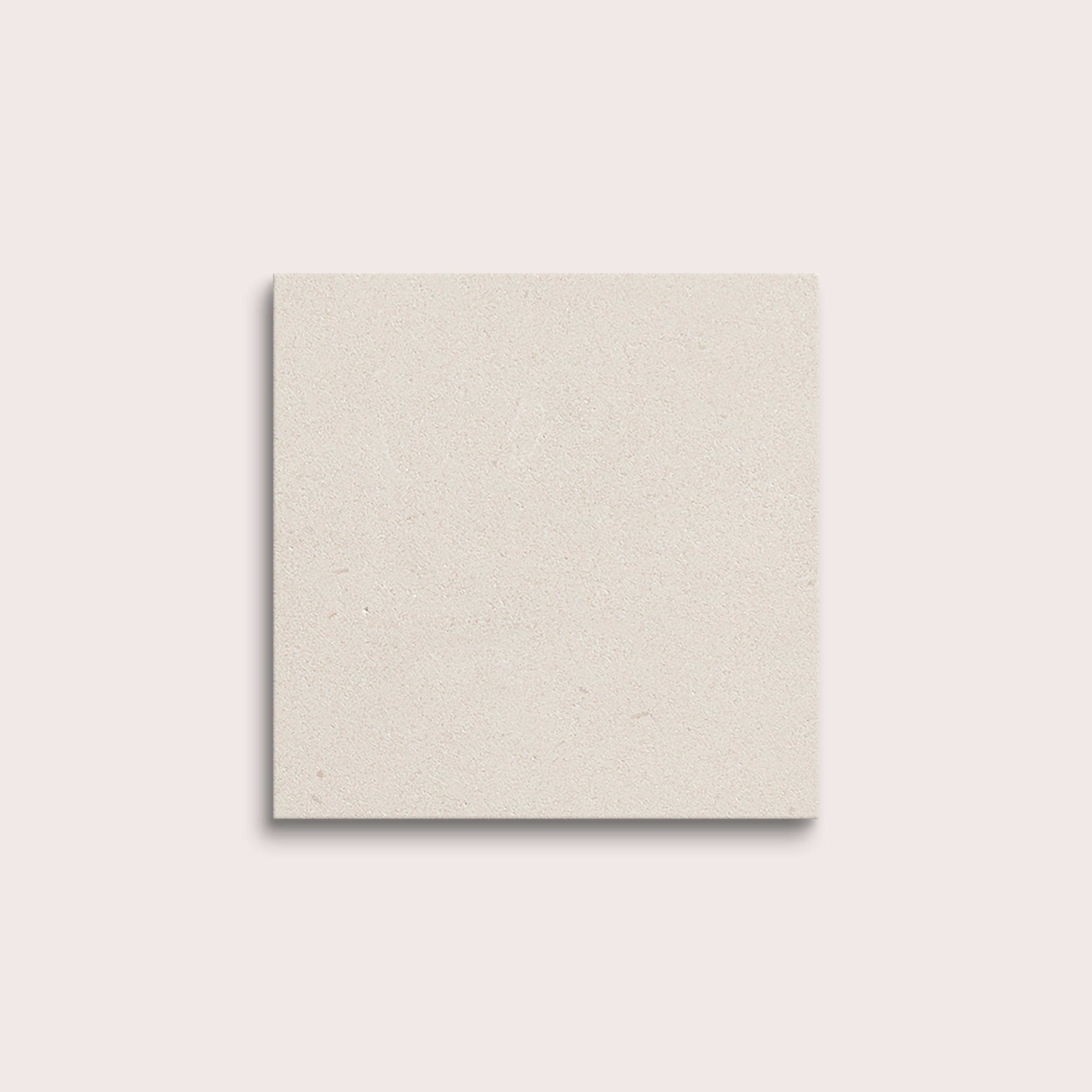square tile with a white limestone pattern on a white background