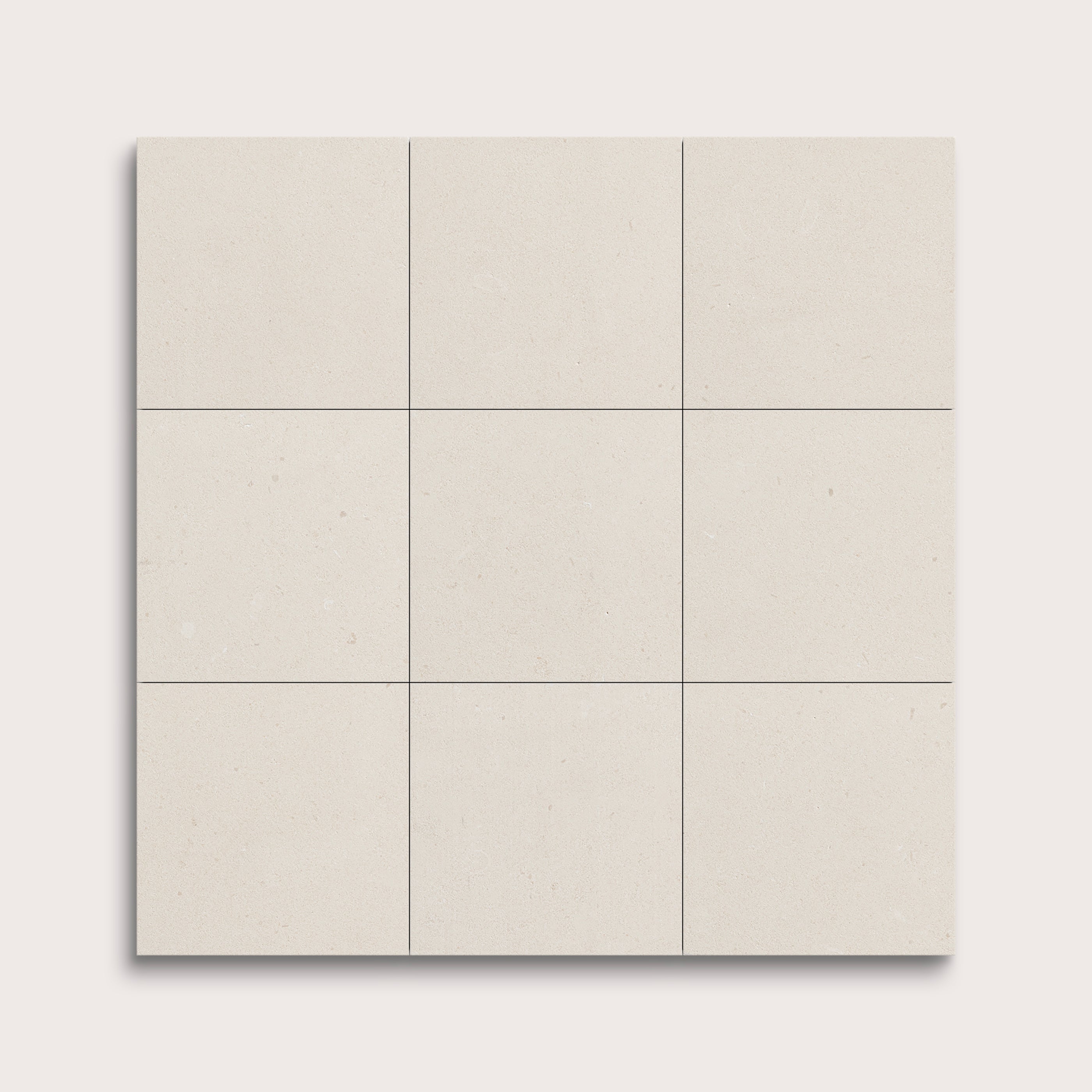 nine square tiles with a white limestone pattern on a white background