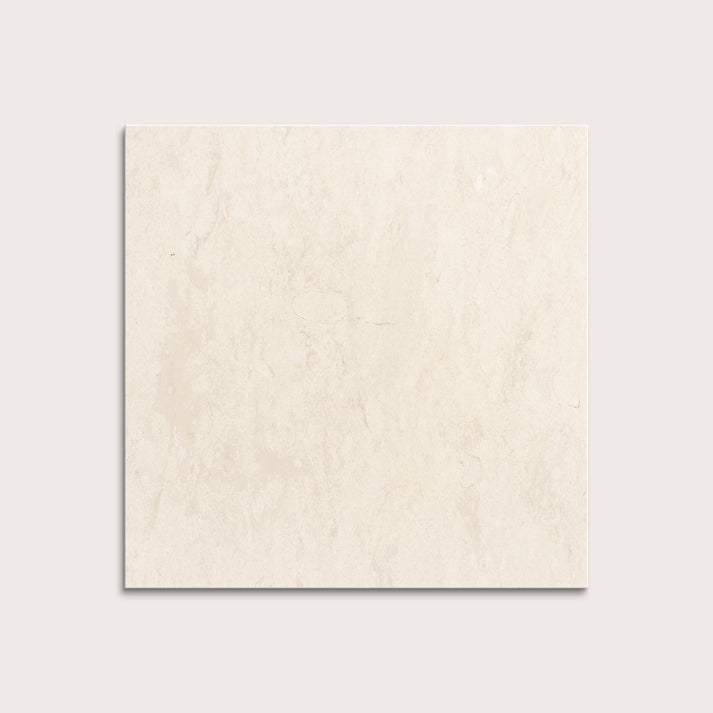square tile with a beige limestone pattern on a white background