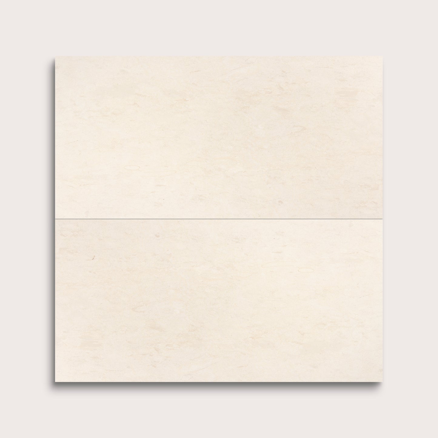 two rectangle tiles with a beige limestone pattern on a white background