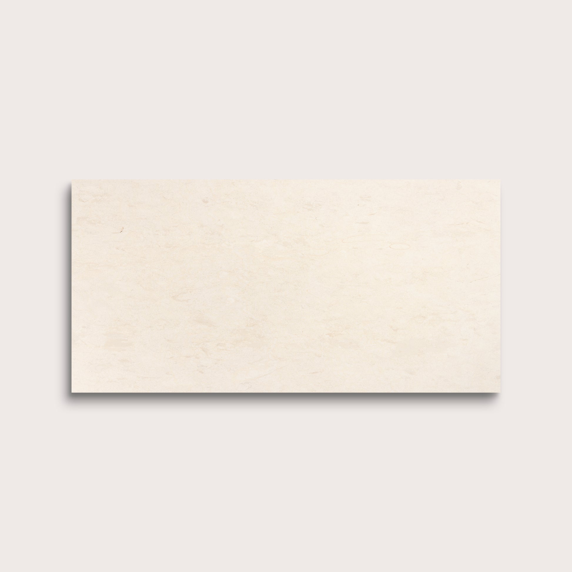 rectangle tile with a beige limestone pattern on a white background