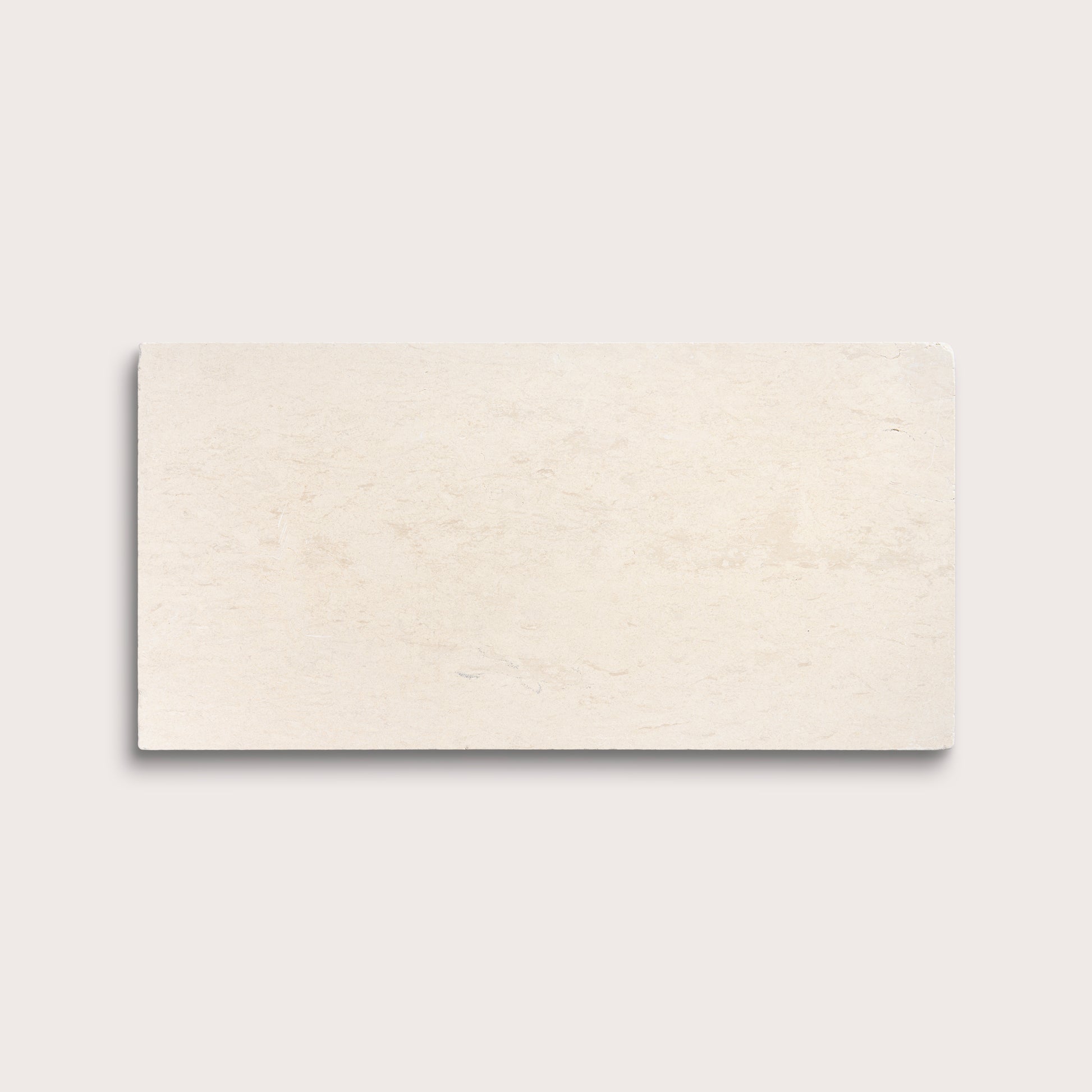 rectangle tile with a beige limestone pattern on a white background