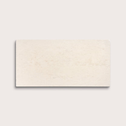 rectangle tile with a beige limestone pattern on a white background