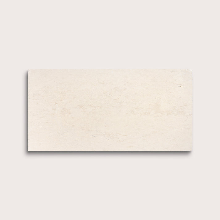 rectangle tile with a beige limestone pattern on a white background