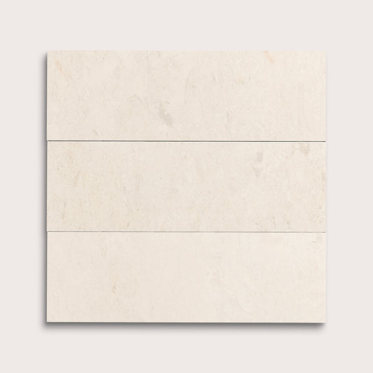 three rectangle tiles with a beige limestone pattern on a white background
