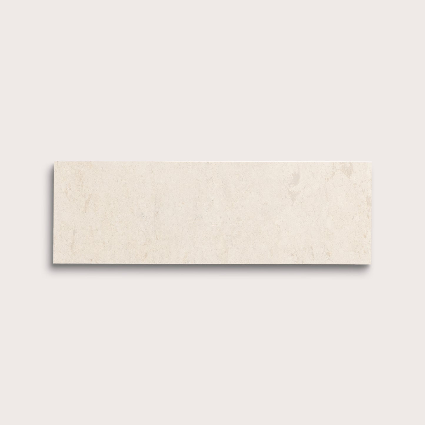 rectangle tile with a beige limestone pattern on a white background