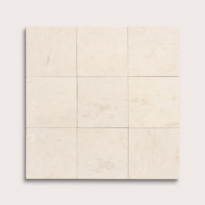 nine square tiles with a beige limestone pattern on a white background