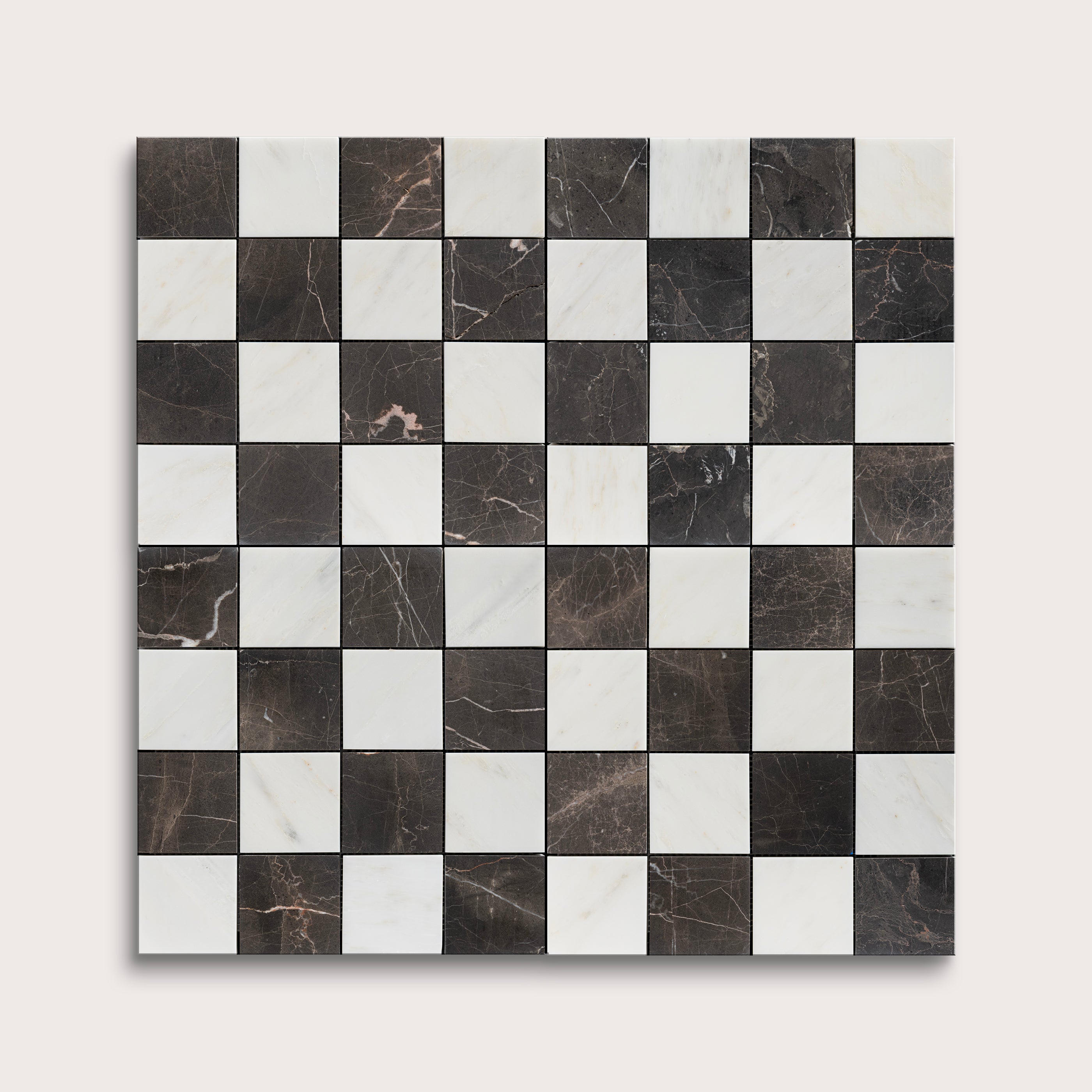 Checkered tile pattern with black and white squares on a white background
