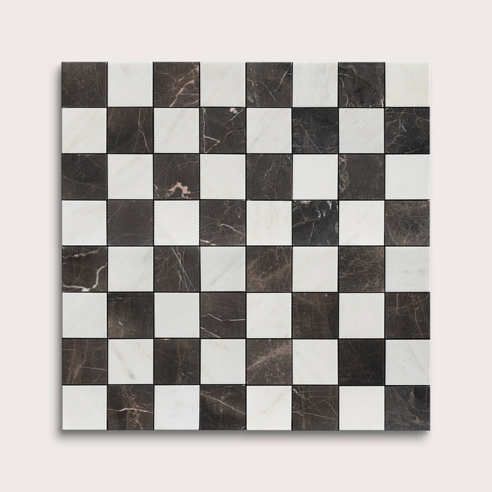 Checkered tile pattern with black and white squares on a white background