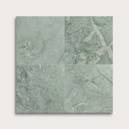 Four green marble tiles arranged in a grid pattern on a white background