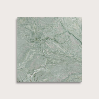Green marble tile on a light gray background