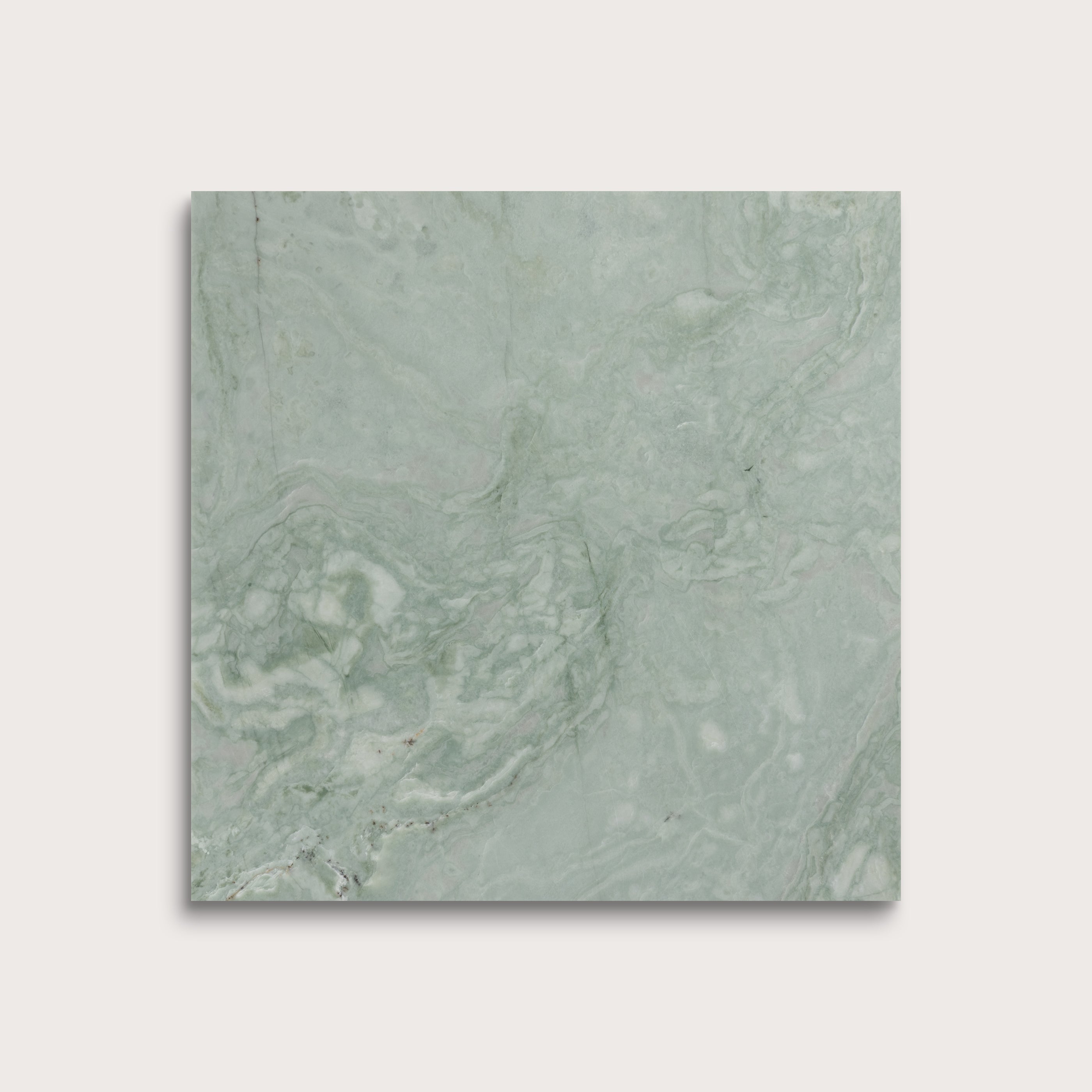 Green marble tile on a light gray background
