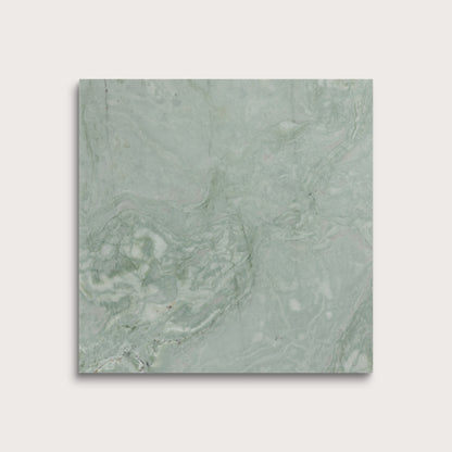 Green marble tile on a light gray background