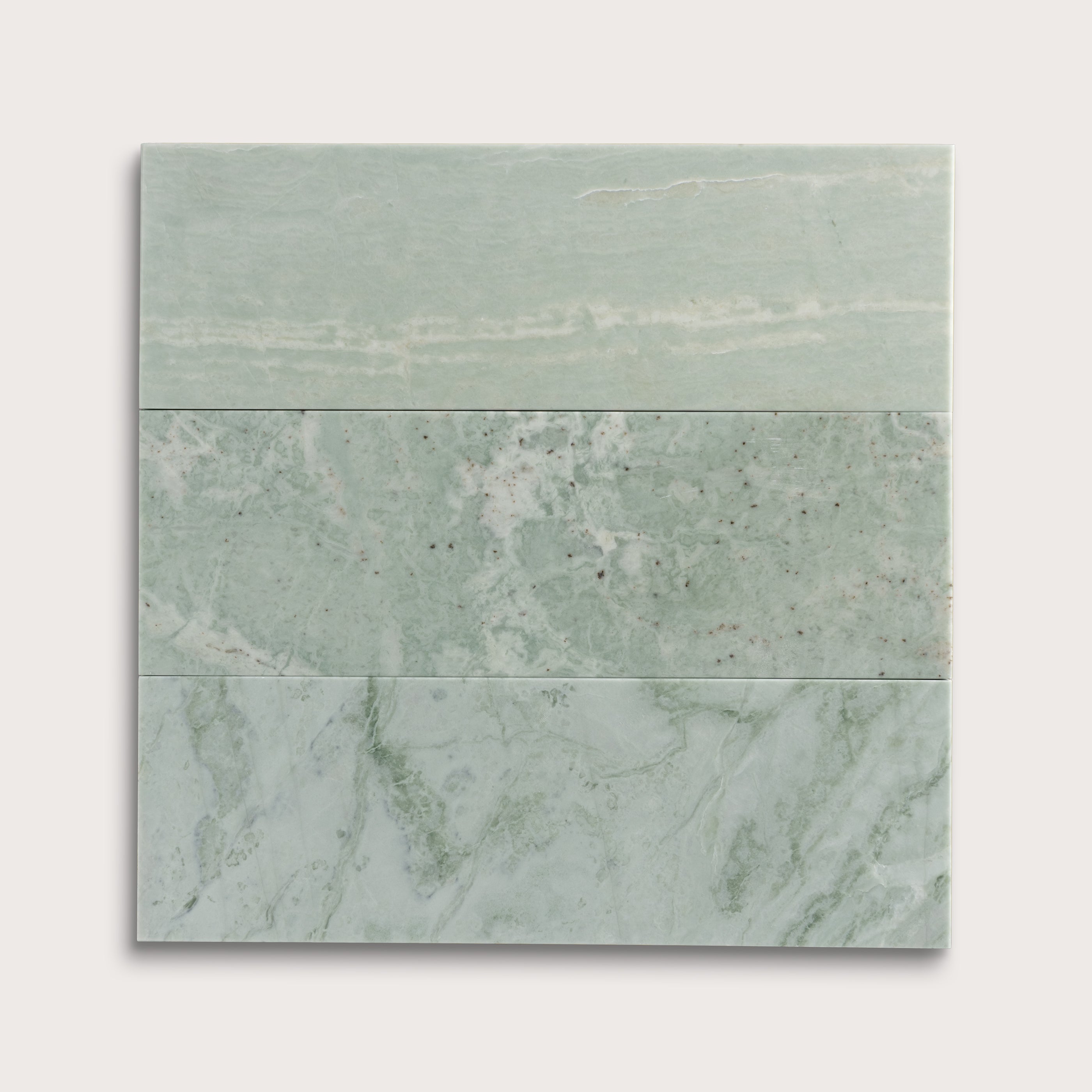 Green Marble-patterned tiles on a white background