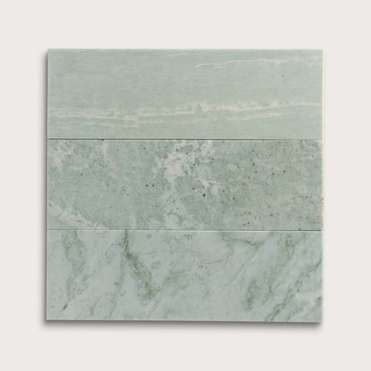 Green Marble-patterned tiles on a white background