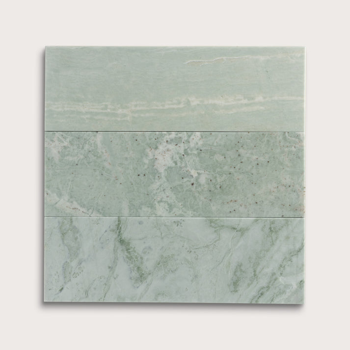 Green Marble-patterned tiles on a white background
