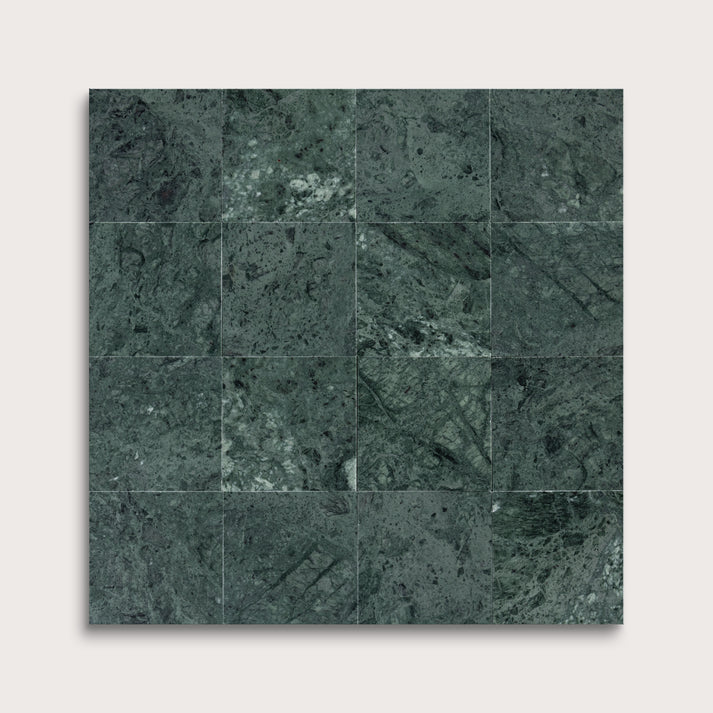Green marble tile pattern on a white background