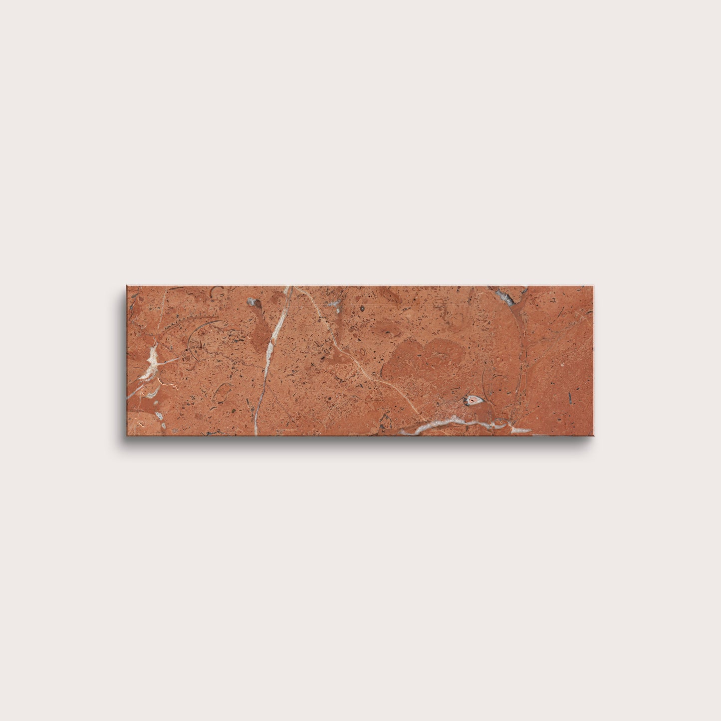 Rectangular brown tile with marble-like pattern on a light gray background