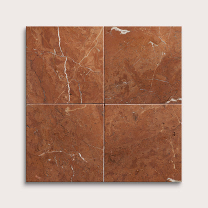Four brown marble tiles arranged in a grid pattern on a white background