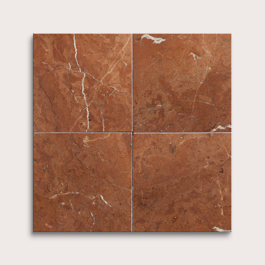 Four brown marble tiles arranged in a grid pattern on a white background