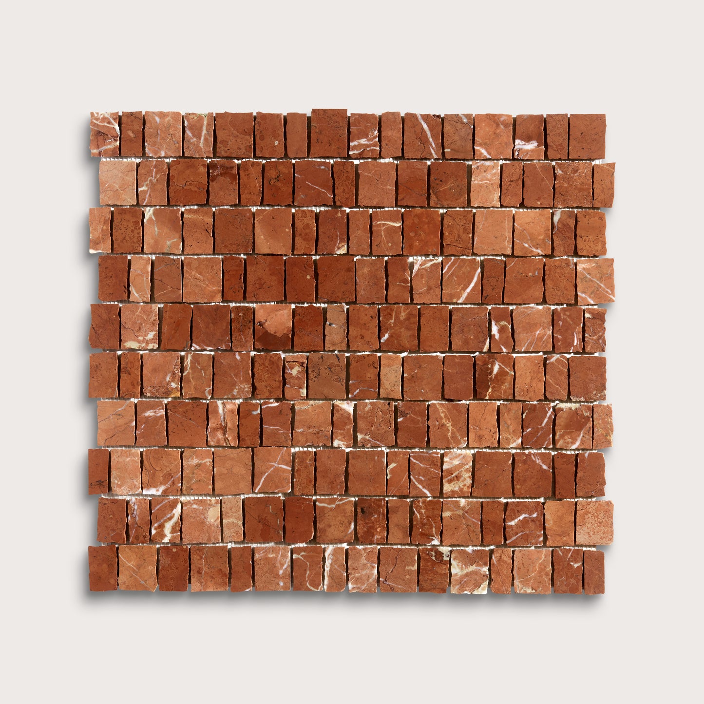 A square sample of reddish-brown marble rectangular mosaic tiles with natural white veining, arranged in horizontal rows on a light gray background.