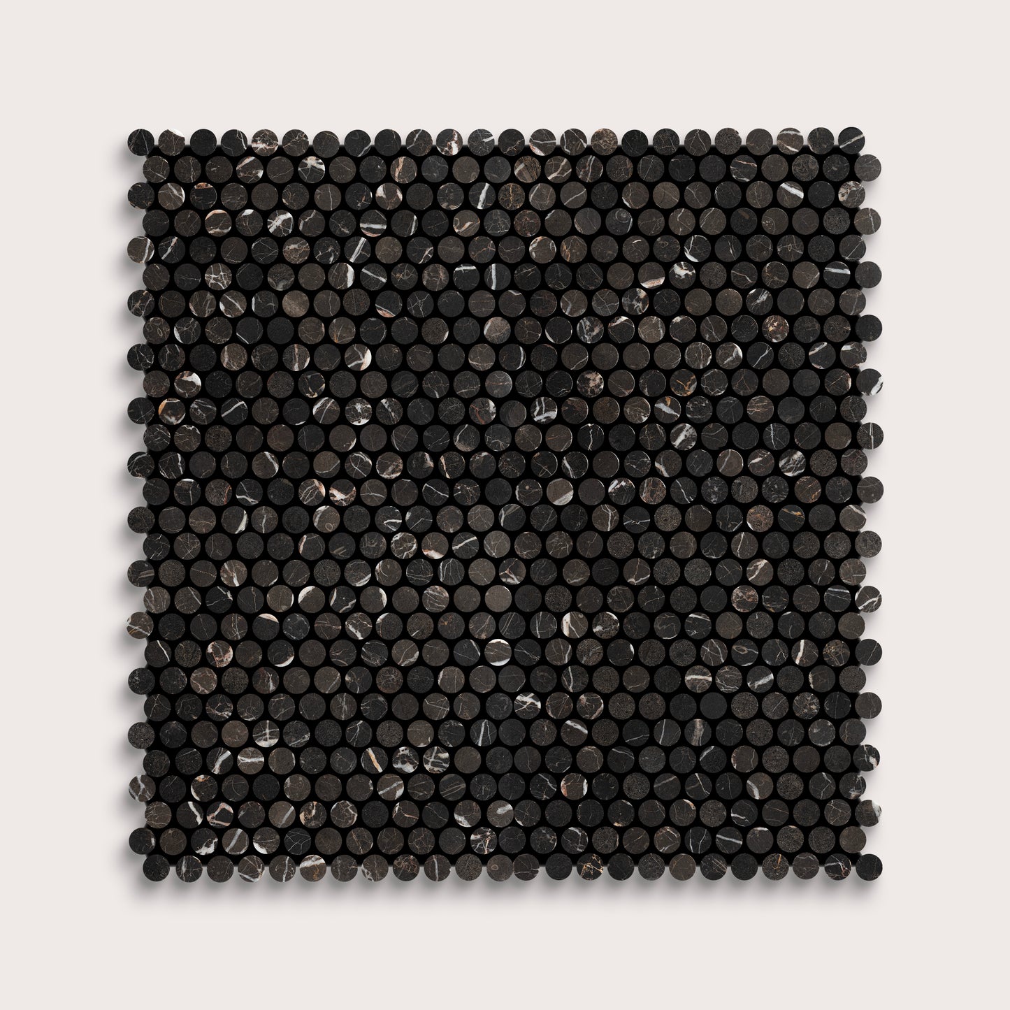 Square marble tile with black circular pattern on a light gray background