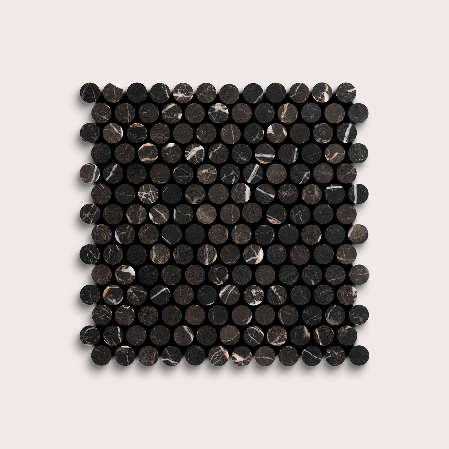 Square arrangement of black circular marble tiles on a light gray background
