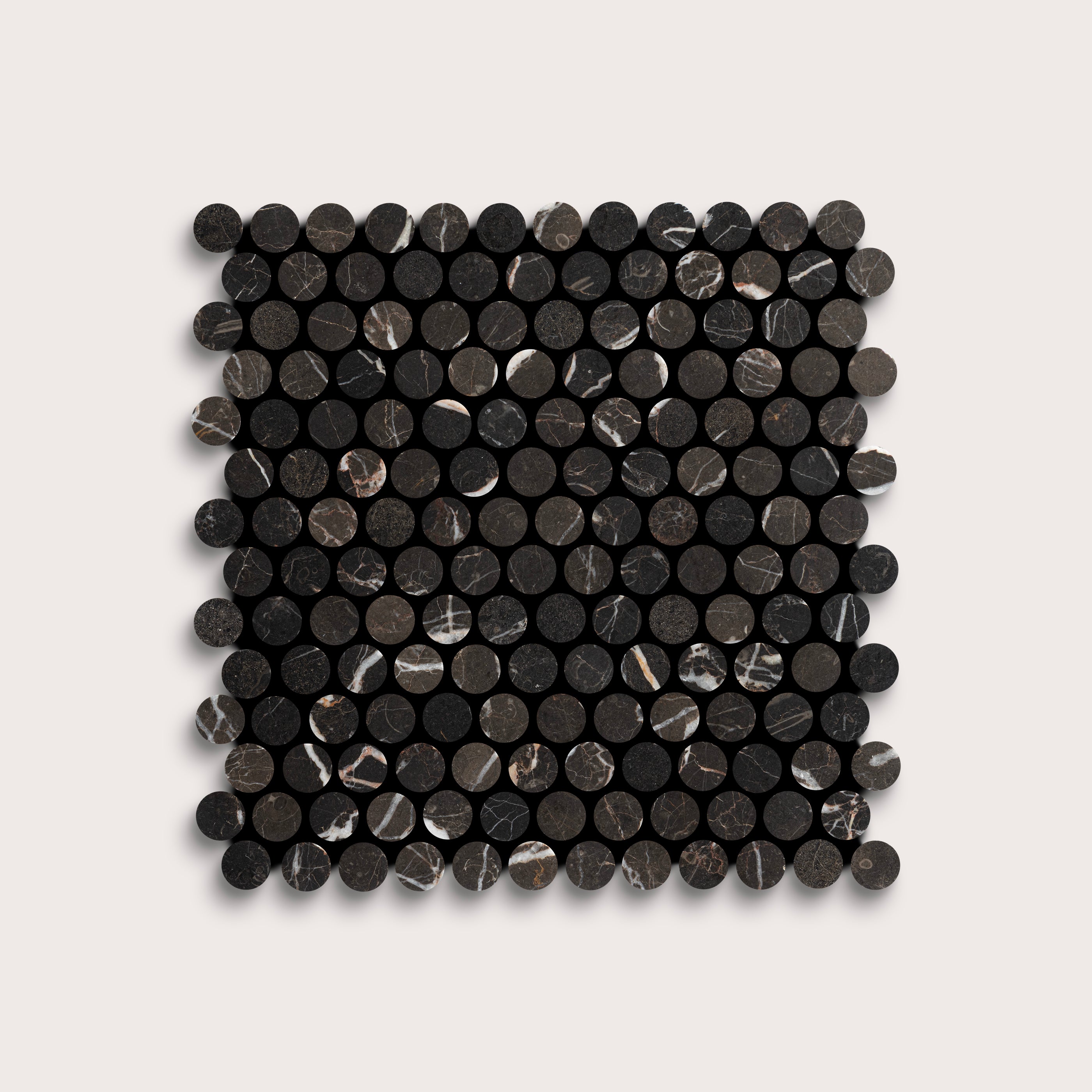 Square arrangement of black circular marble tiles on a light gray background